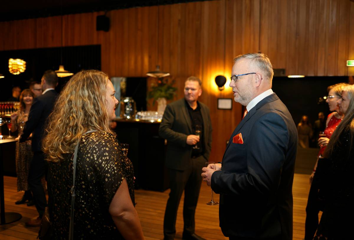 what are professional development opportunities: professionals networking at a virtual business event with video call screens and digital whiteboards