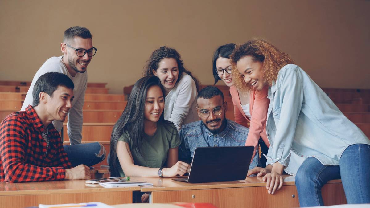Diverse professionals engaging in career networking events at a modern conference hall